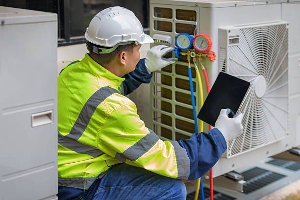 Professional Heat Pump Repair technician working in Far Hills, NJ